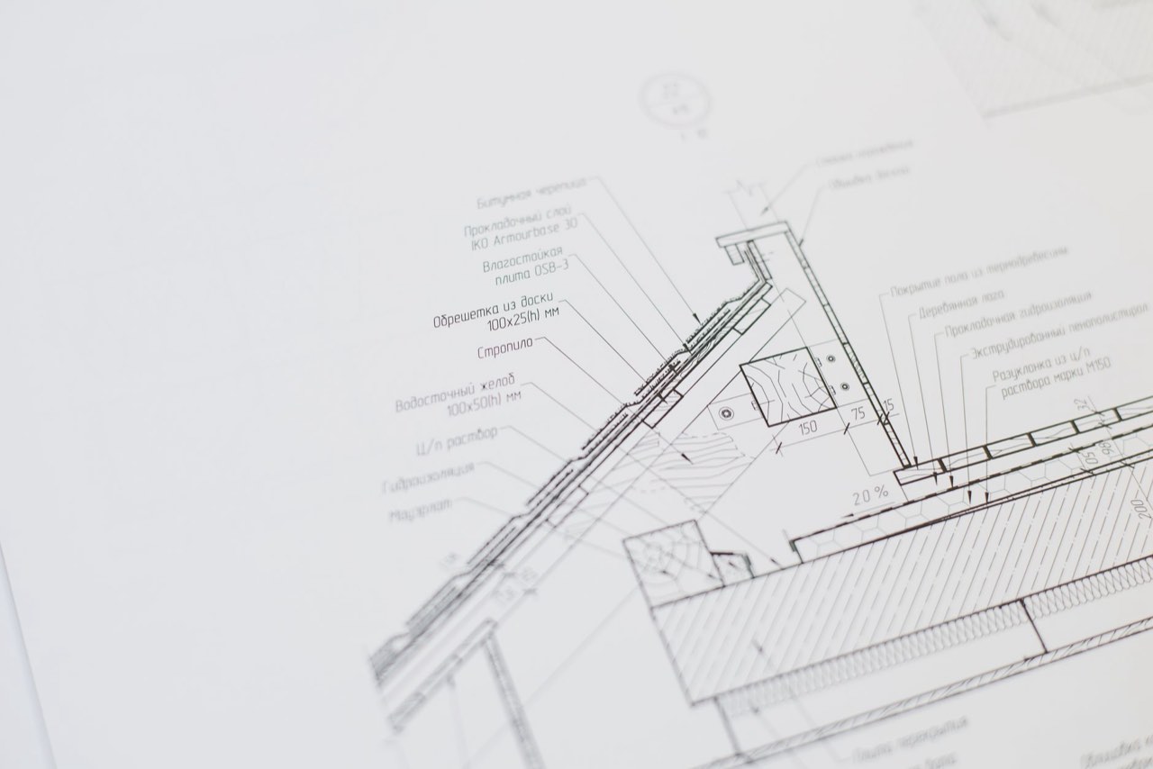 A printed roof eaves detail drawing, its layers labelled with leader lines and dimensions